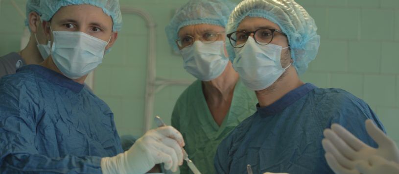 Neurosurgeons reviewing epilepsy surgery results